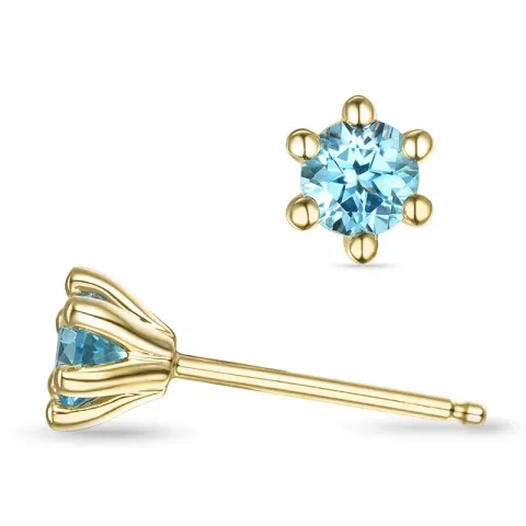 2 x 0,30 ct topas solitäreörhängestift i 9 karat guld med topas