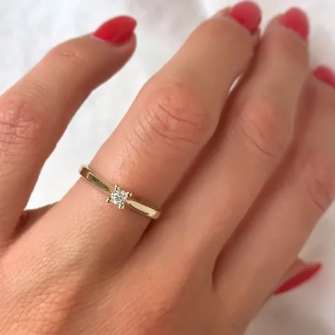 kampajn -  diamant solitärring i 14  karat guld 0,10 ct