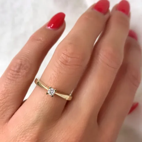 kampajn -  diamant solitärring i 14  karat guld 0,12 ct