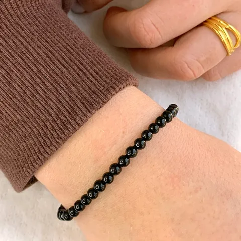 Simpel svart onyx armband i läderband