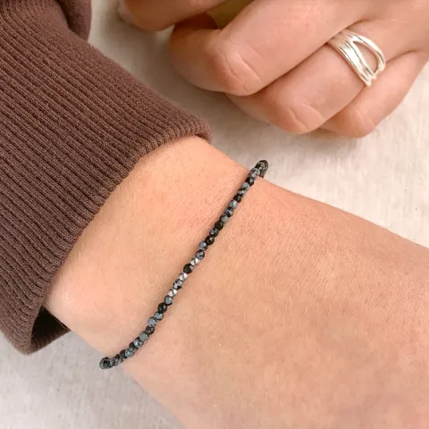 sten armband med obsidian og 3 hematite.