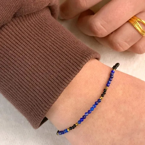 sort armband med onyxer og lapis og 6 hematite.