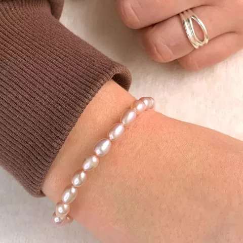 pärla armband i rosa silkes snöre 17cm plus 3cm x 5,4 mm