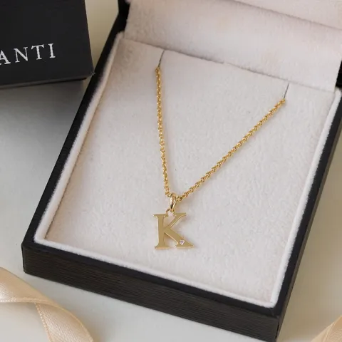 bokstav k diamant hängen i 9 carat guld 0,01 ct