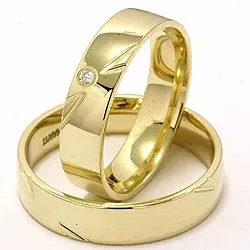 Elegant vigselsringar i 14  karat guld 0,025 ct - set