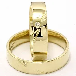 Elegant vigselsringar i 14  karat guld 0,025 ct - set
