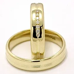 vigselsringar i 14  karat guld 0,091 ct - set