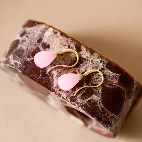 örhängen i 9 karat guld med rosa krystal