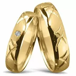 mönster vigselsringar i 14  karat guld 0,025 ct - set