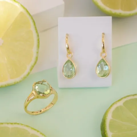 ljusgrön kristal ring i förgylld mässing - Eliné
