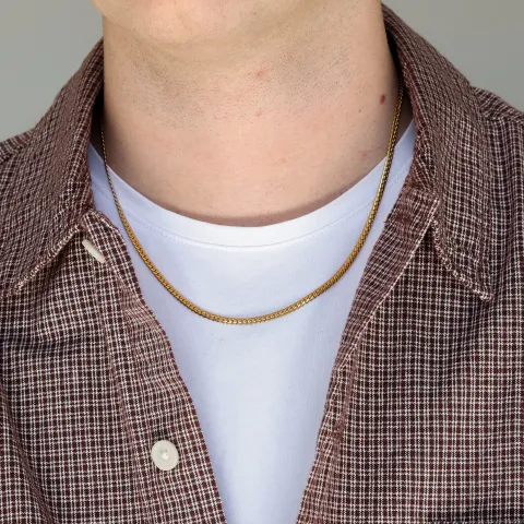 vattentät halsband i förgyllt stål  x 3 mm 