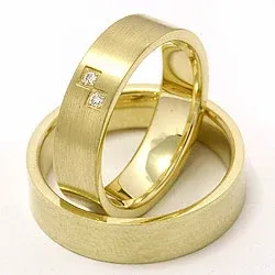 Matta platta vigselsringar i 14  karat guld 2 x 0,015 ct - set
