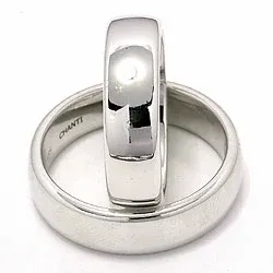 Bredd ovala vigselsringar i 14  karat vitguld - set