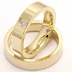 platta vigselsringar i 14  karat guld 0,10 ct - set