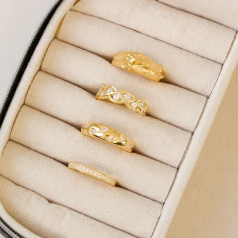Flätat zirkon ring i förgyllt silver