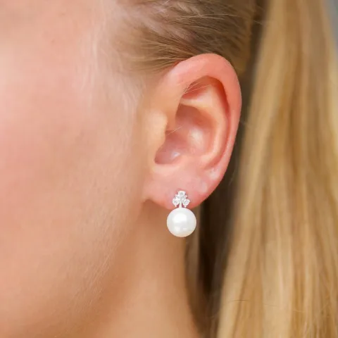 blommor pärla örhängen i silver