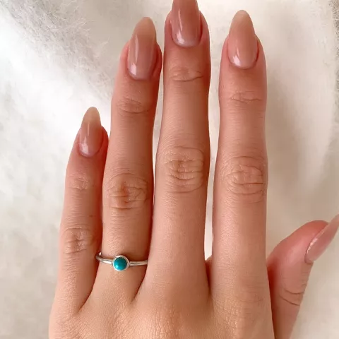 Rund blå ring i silver