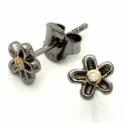 små blommor örhängestift i svart rhodinerat silver med förgyllt silver