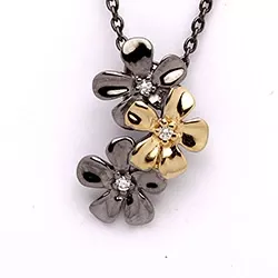 Dark Harmony blommor hängen i svart rhodinerat silver och förgyllt silver