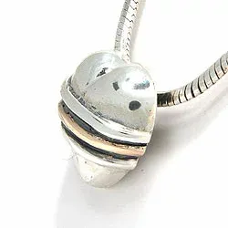 hängen i oxiderat sterlingsilver och 8 karat guld