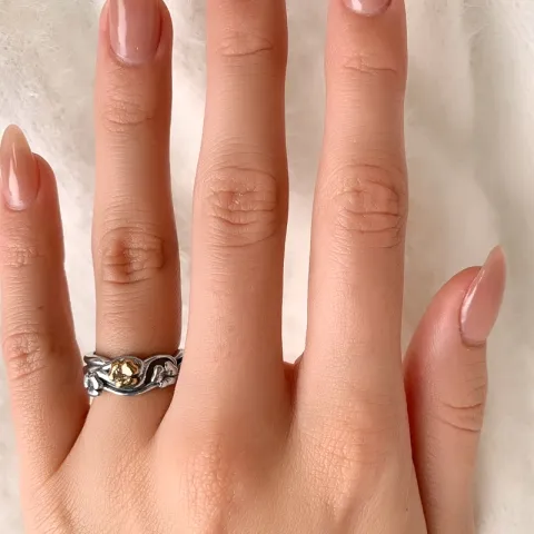 Blommor ring i oxiderat sterlingsilver med 8 karat guld