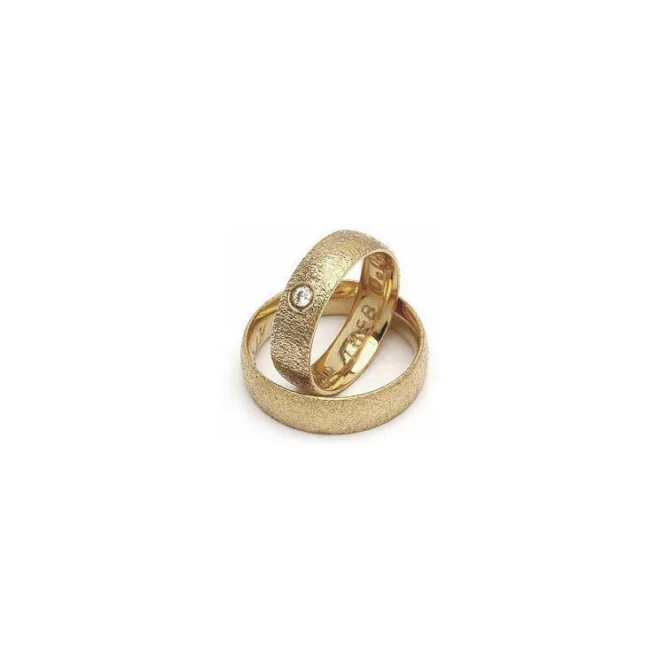 Vigselsringe från rs of scandinav i 8 karat guld 0,03 ct