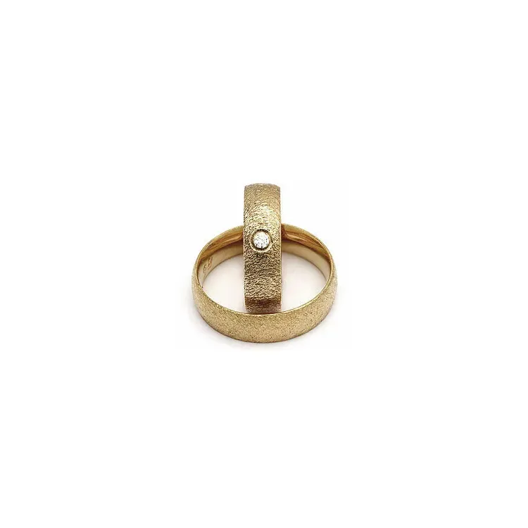 Vigselsringe från rs of scandinav i 8 karat guld 0,03 ct