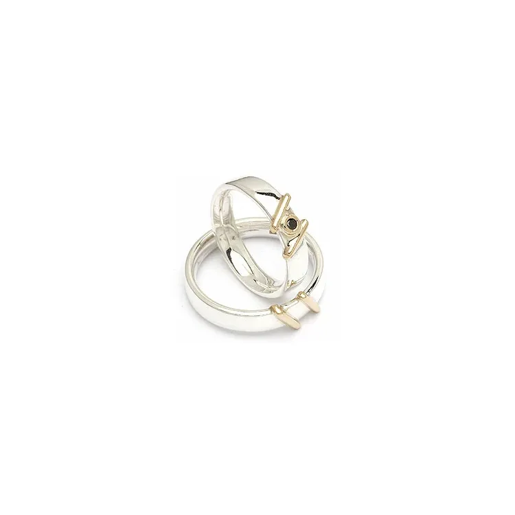 Vigselsringe från rs of scandinav i silver och vanl. guld 0,03 ct