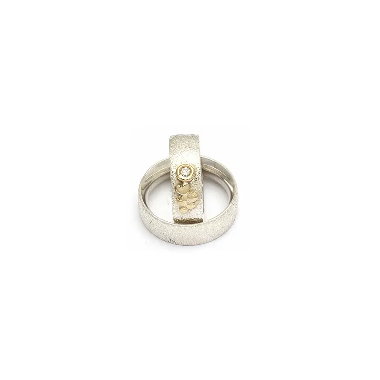 Vigselsringe från rs of scandinav i silver och vanl. guld