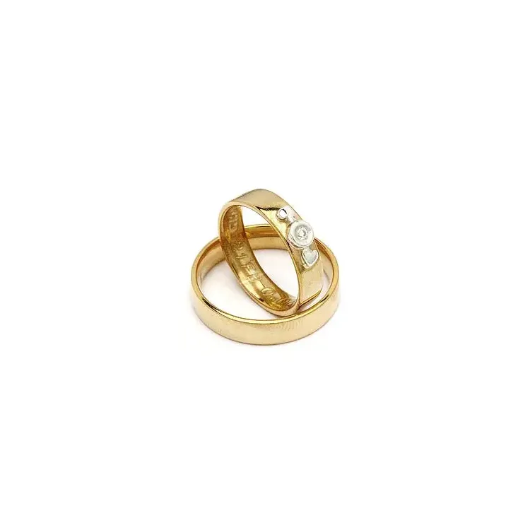 Vigselsringe från rs of scandinav i guld- och vitguld 0,02 ct
