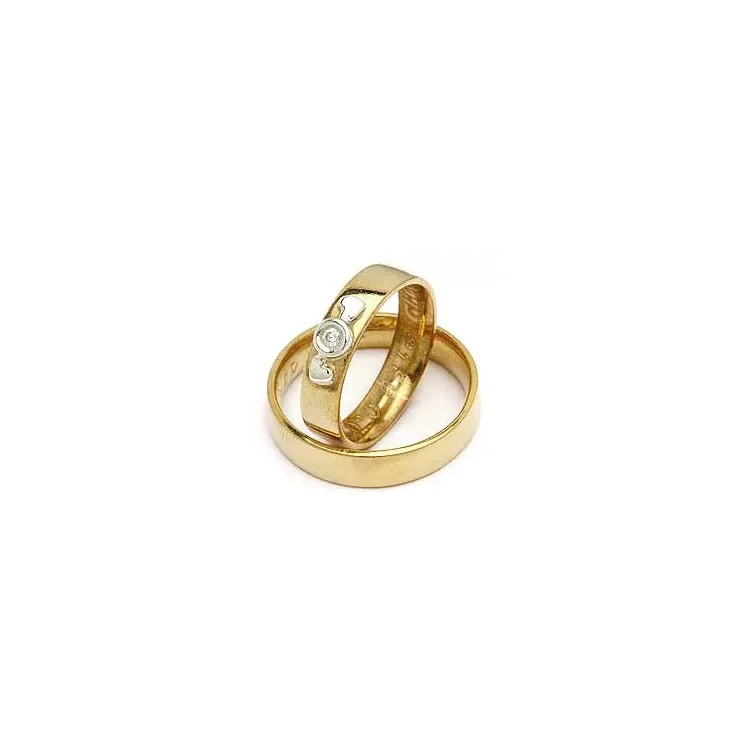 Vigselsringe från rs of scandinav i guld- och vitguld 0,02 ct