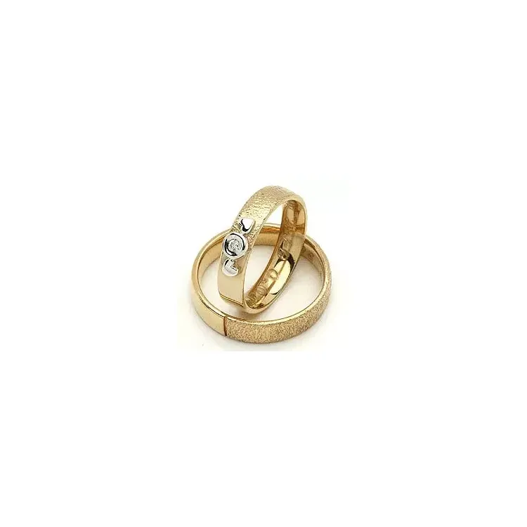 Vigselsringe från rs of scandinav i 8 karat guld- och vitguld 0,02 ct