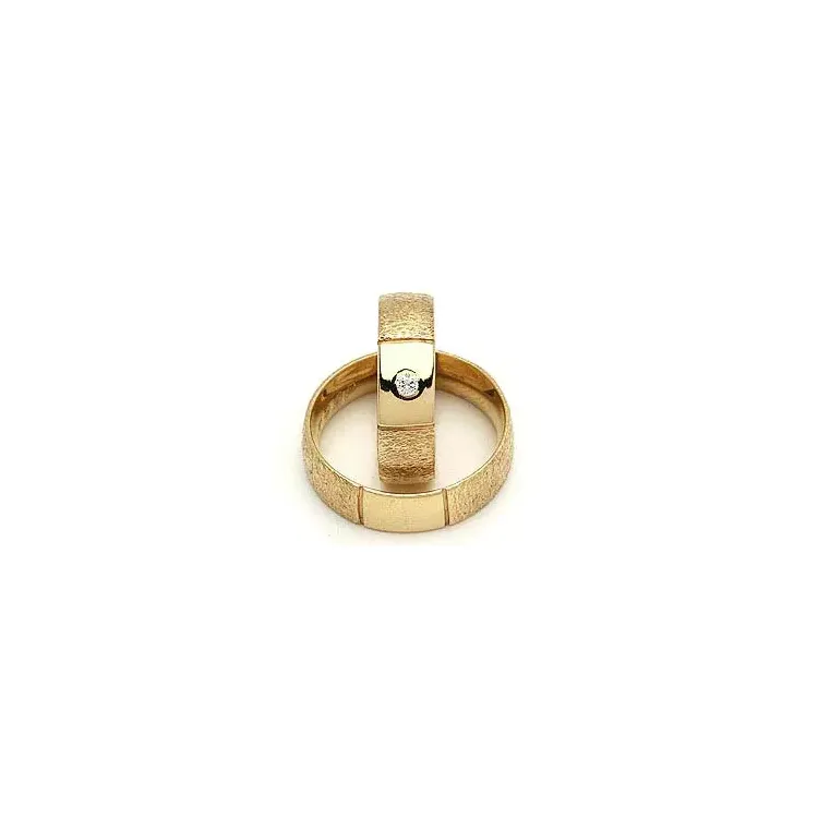 Vigselsringe från rs of scandinav i 8 karat guld 0,03 ct