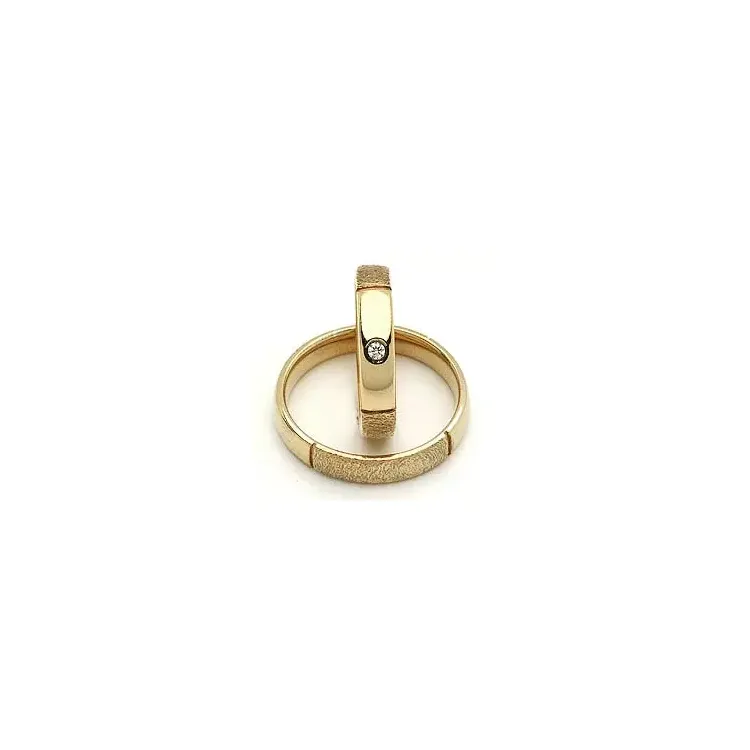 Vigselsringe från rs of scandinav i 8 karat guld 0,02 ct