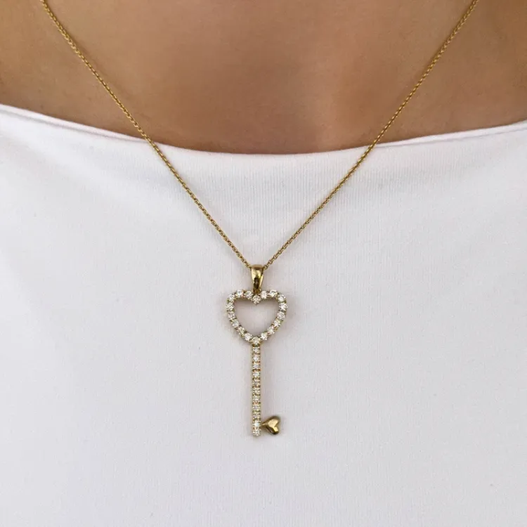 Nyckel diamantberlocker i 14 carat guld 0,55 ct