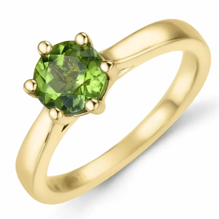 grön peridot solitärring i 14 karat guld 1,27 ct