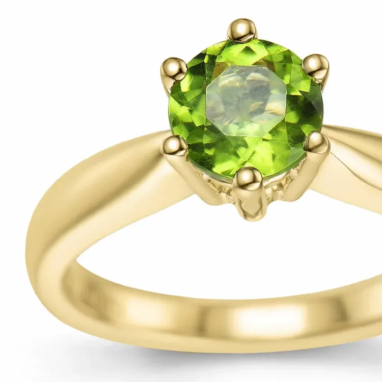 grön peridot solitärring i 14 karat guld 1,27 ct