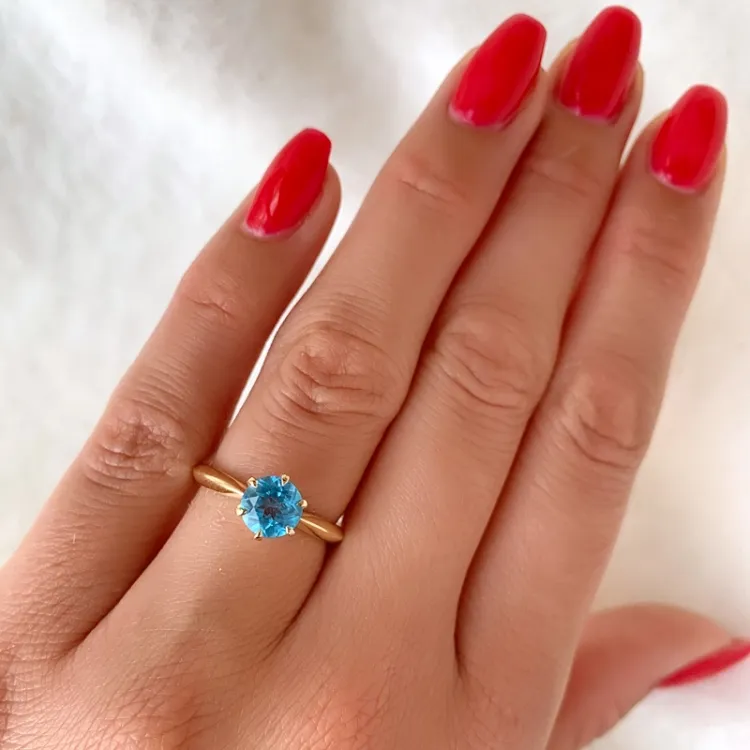 topas solitärring i 14  karat guld 1,35 ct