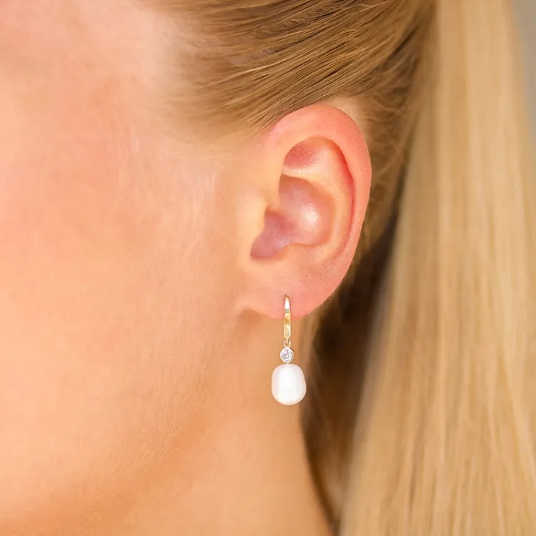 pärla örhängen i 9 karat guld med zirkon - Gold Collection