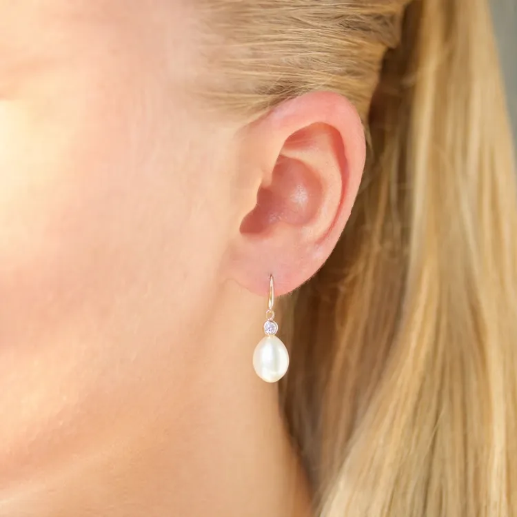 örhängen i 9 karat guld med zirkon - Gold Collection