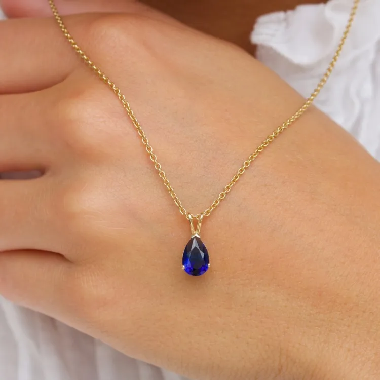 droppe blå syntetisk safir hängen i 14 karat guld - Gold Collection