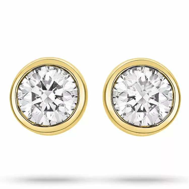 diamant solitäreörhängestift i 14 karat guld med diamant