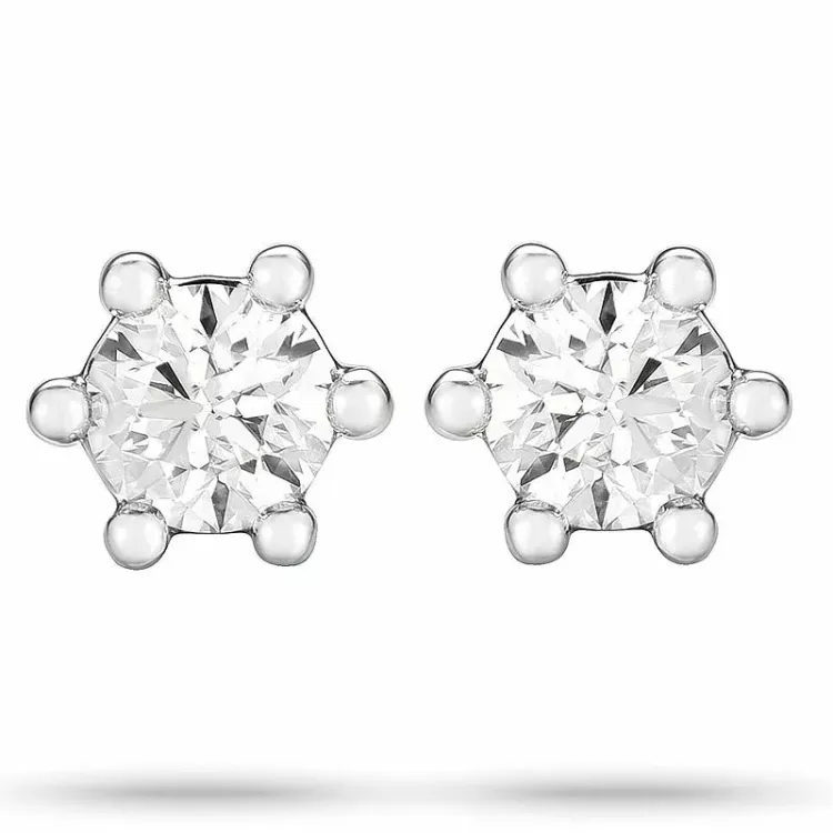 2 x 0,20 ct diamant solitäreörhängestift i 14 karat vitguld med diamant 
