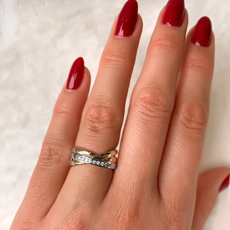 abstrakt diamant ring i 14 karat gul-, vit- och rödguld 0,09 ct