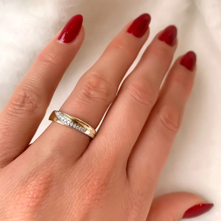 Diamant guld ring i 14 karat guld- och vitguld 0,08 ct