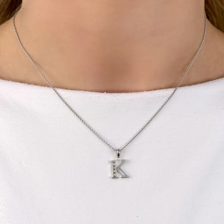 bokstav k hängen i 14  carat vitguld 0,04 ct