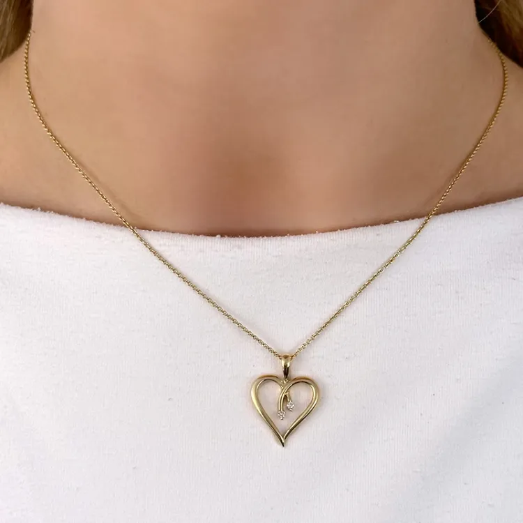 hjärta diamantberlocker i 14 carat guld 0,04 ct