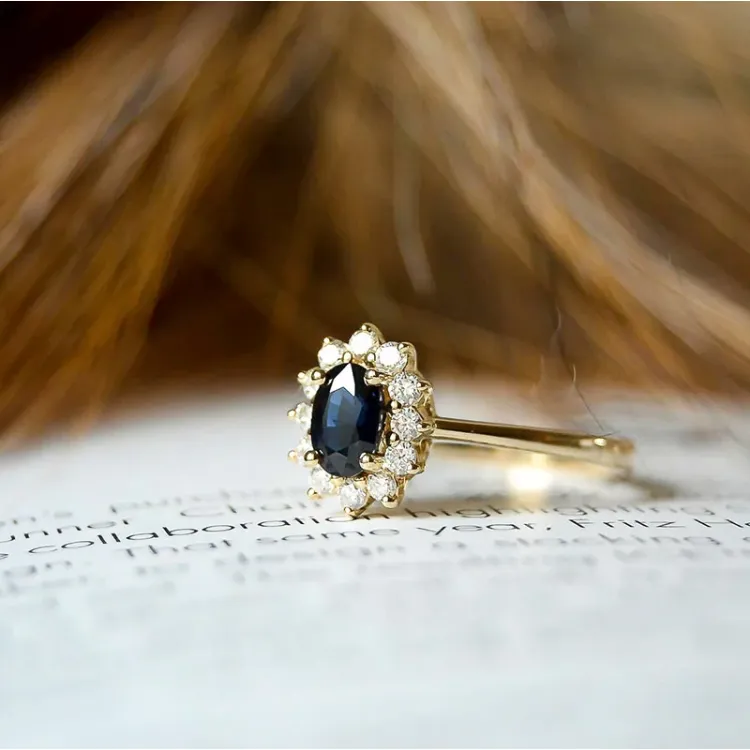 safir rosettring i 14  karat guld 0,26 ct 0,65 ct