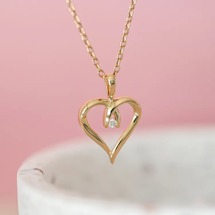 hjärta diamant hängen i 14  carat guld 0,04 ct