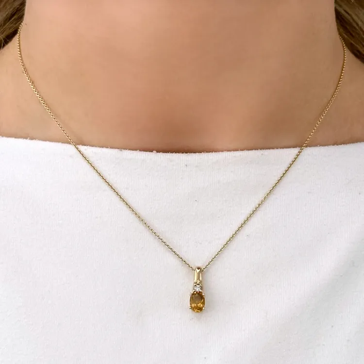citrin hängen i 14  carat guld 0,05 ct 0,80 ct